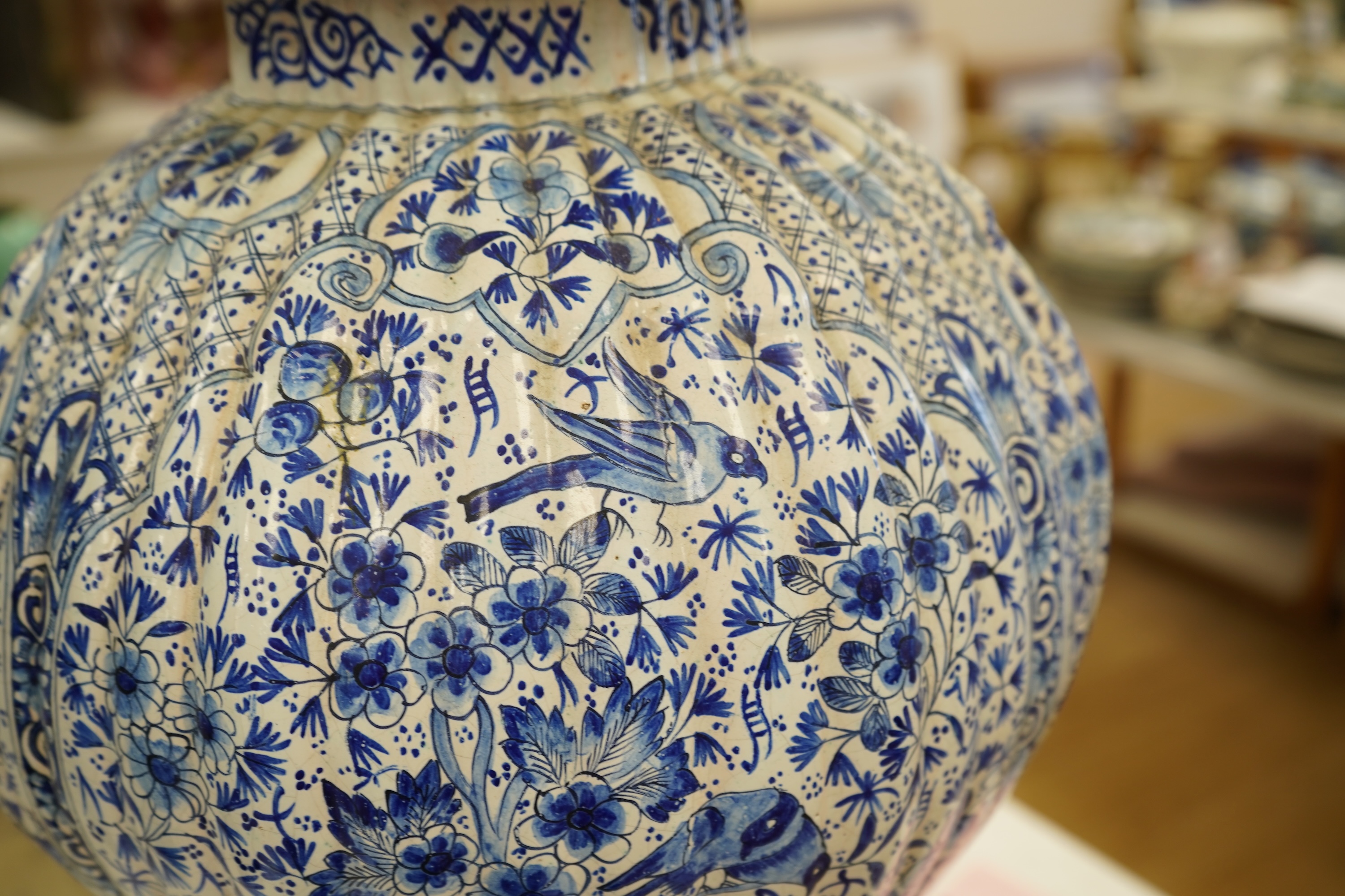 A large Delft blue and white vase and cover, 65cm tall